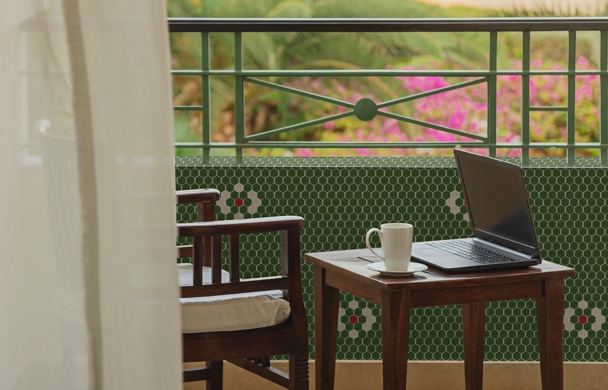 Freelancer or businessman working remotely with laptop on hotel balcony at resort while traveling. Workplace without people